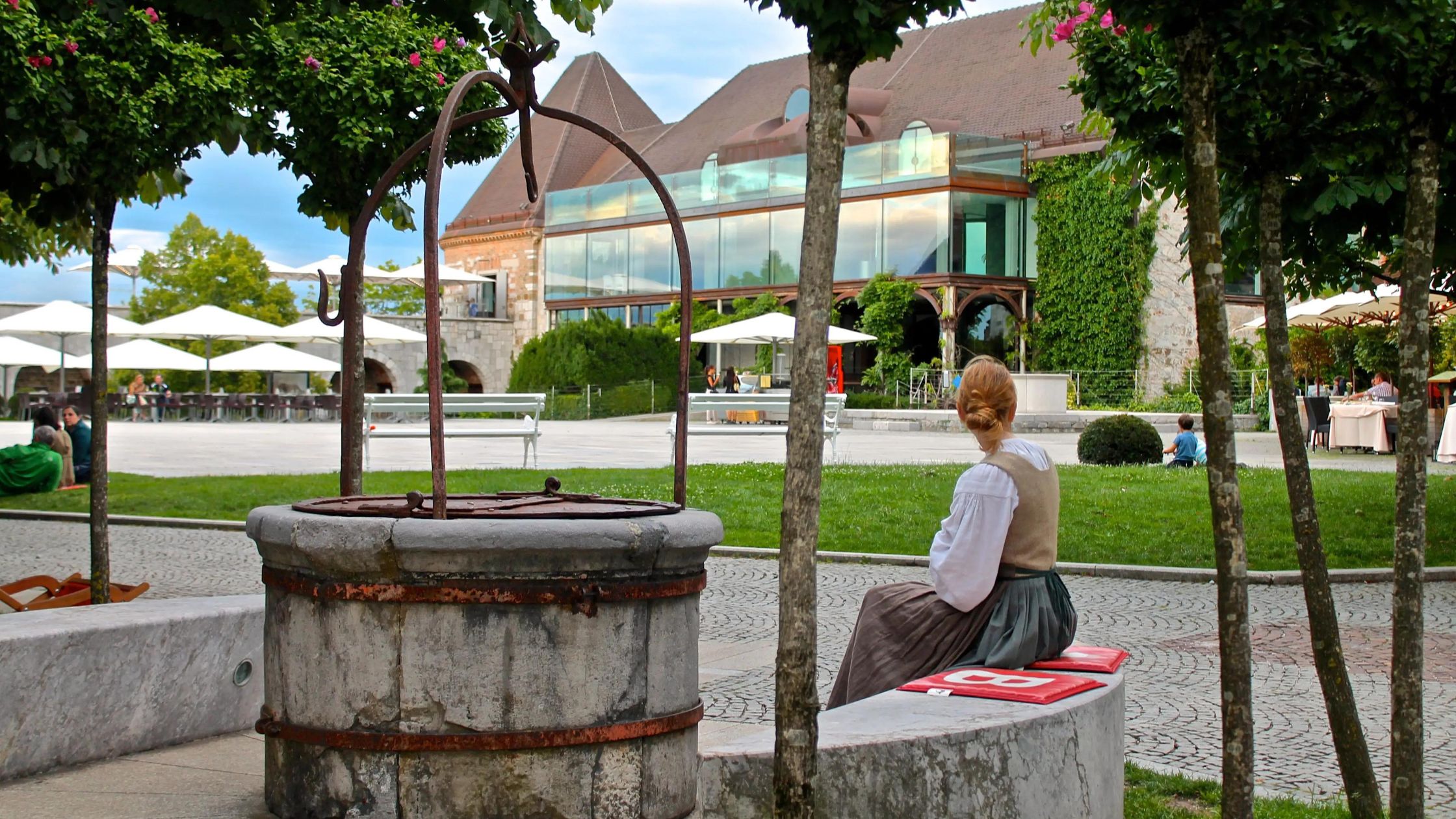 A giril sitting in slovenia